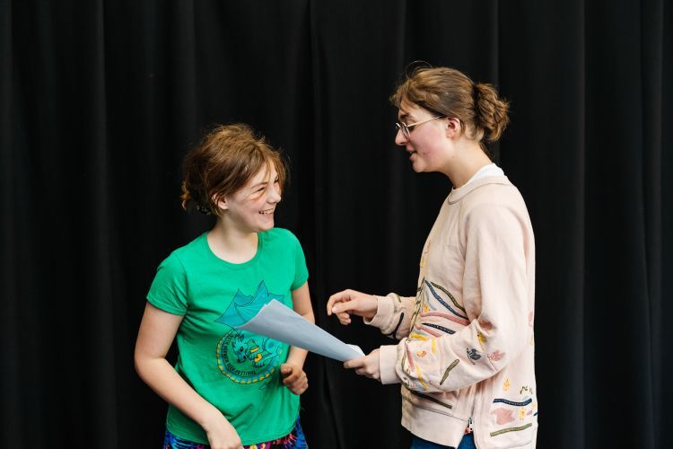 Children reading a drama skit